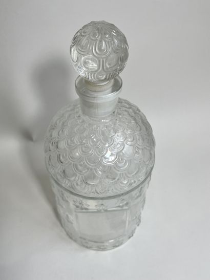 GUERLAIN
Molded glass bottle, colorless bee...