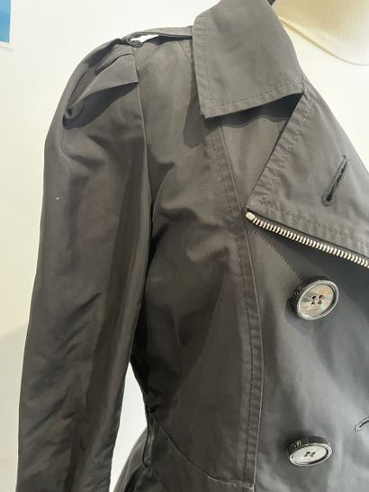 MONCLER
Black raincoat with chrome metal...