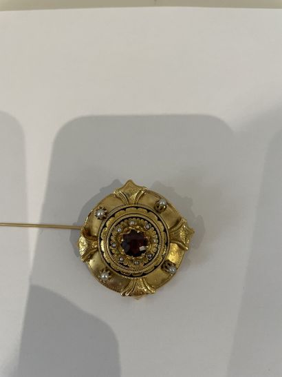 Metal PIC with round motif punctuated by...