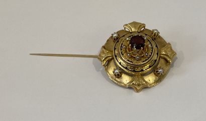 Metal PIC with round motif punctuated by...