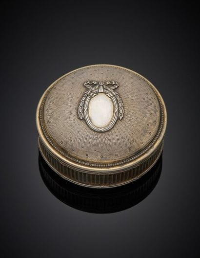 Puiforcat.
A gilt-edged, round-shaped, 1er...