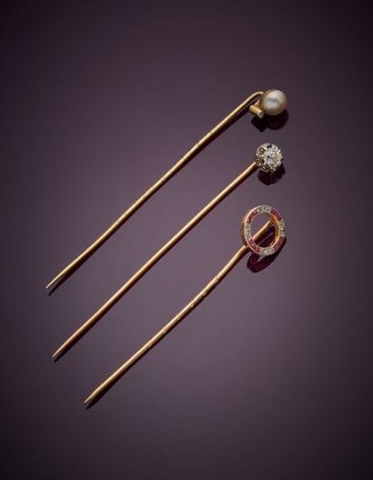 Lot including:
14K yellow gold 585‰ tie pin,...