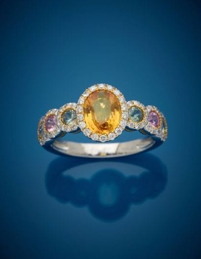 Platinum ring set with a yellow sapphire...