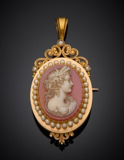 Oval-shaped 18K yellow gold 750‰ pendant...