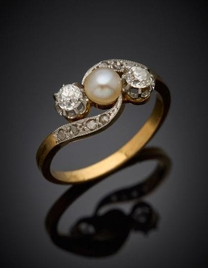 Two-toned 18K gold 750‰ ring, movement form,...