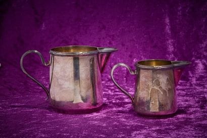 Huvelliez
Two silver-plated creamers, truncated...