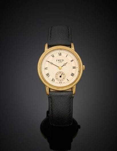 FRED
Men's wristwatch in gilt metal, round...
