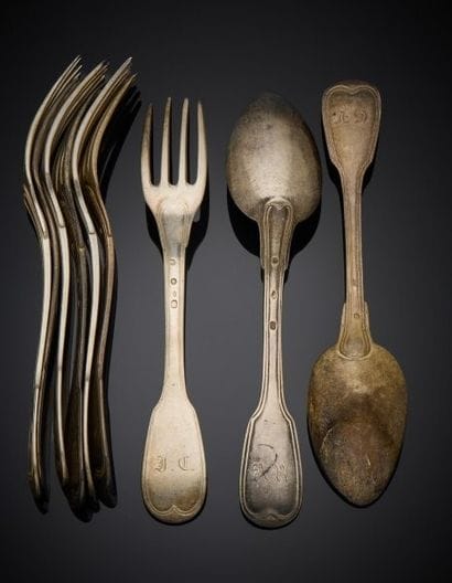 Lot including:
-Silver flatware 1st title...