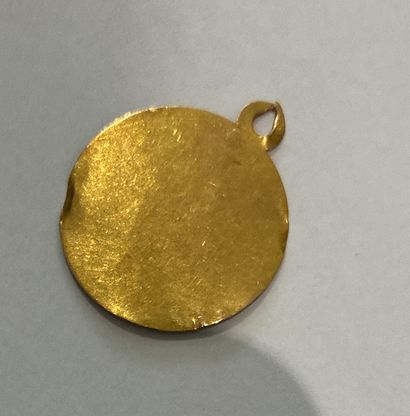 MEDAL in 18K (750 thousandths) yellow gold,...