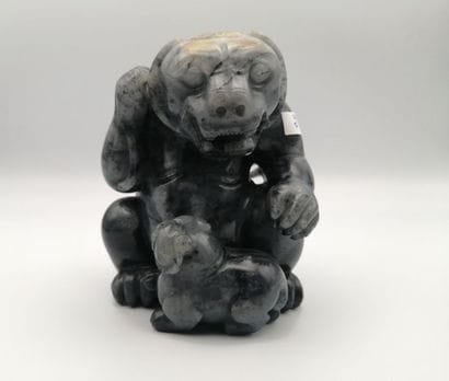 CHINA, 20th century. Group in grey jade representing...