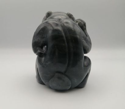 CHINA, 20th century. Group in grey jade representing...