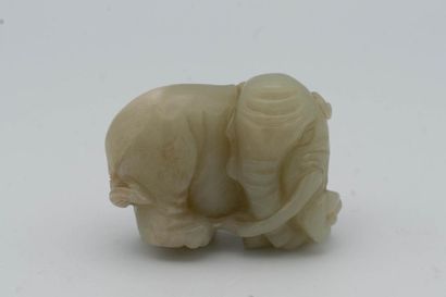 CHINA, early 20th century. Celadon jade elephant....