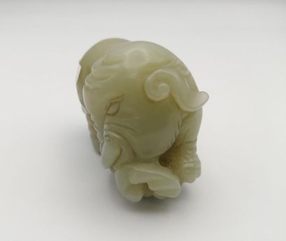 CHINA, early 20th century. Celadon jade elephant....