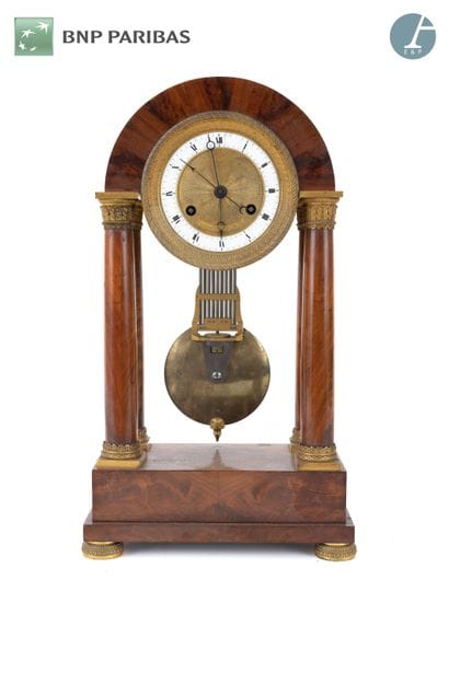 Mahogany and gilt bronze clock with four...