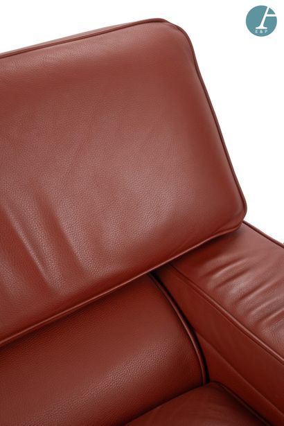 STRAFOR
Pair of brick-red leather armchairs....