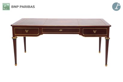 Mahogany flat desk opening to three drawers...