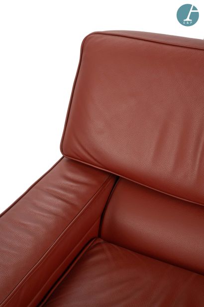 STRAFOR
Pair of brick-red leather armchairs....