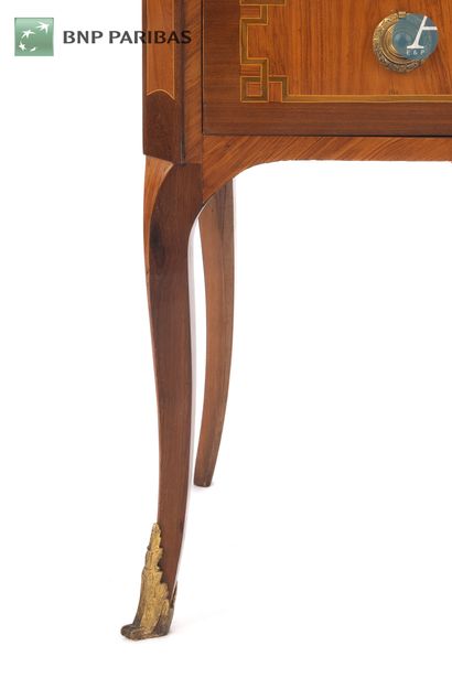 Rosewood and amaranth chest of drawers opening...