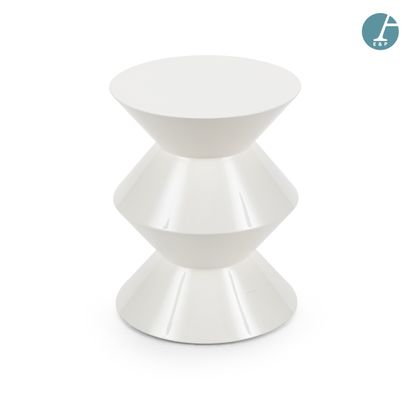 Pair of small circular tables/stools in molded...