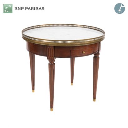 A small molded and carved mahogany pedestal...