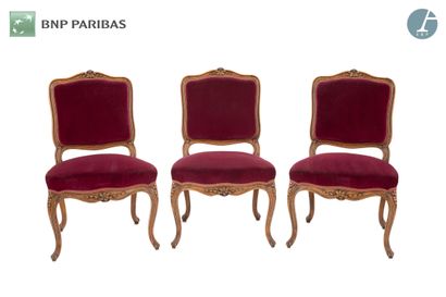 Suite of three chairs in natural wood molded...