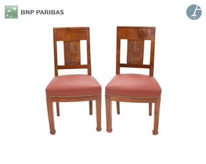 Pair of chairs in molded and carved natural...