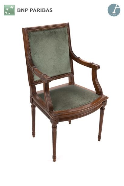 Armchair in natural wood molded and carved....