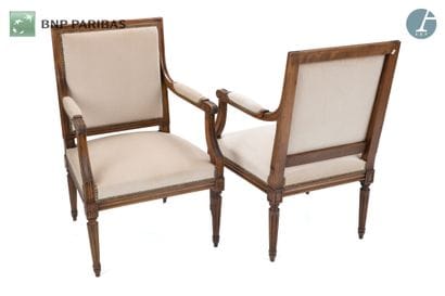 Pair of armchairs in molded and carved natural...