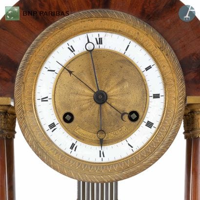 Mahogany and gilt bronze clock with four...
