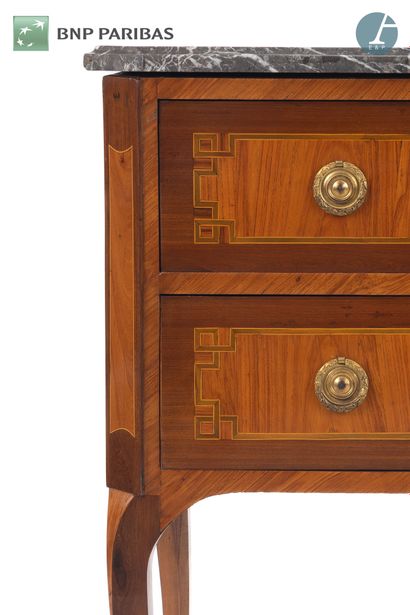 Rosewood and amaranth chest of drawers opening...