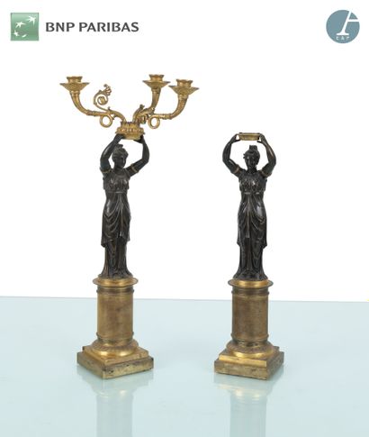 Pair of candelabras with draped women in...