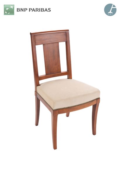 Chair in molded and carved natural wood,...