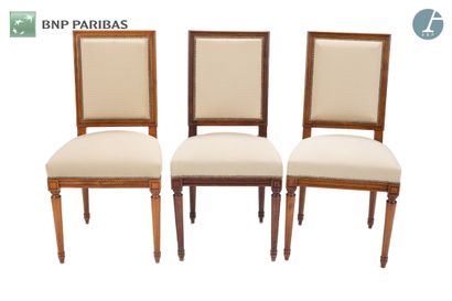 Pair of chairs in molded and carved natural...