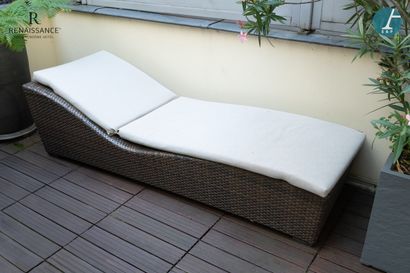 An outdoor chaise longue in laminated and...