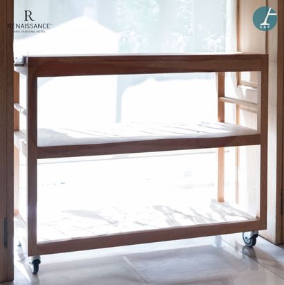 Console in natural wood, legs with casters.
H:...