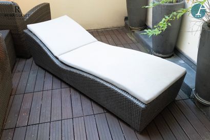 An outdoor chaise longue in laminated and...