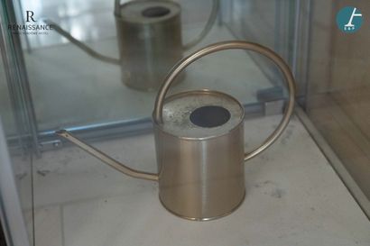 Un arrosoir en métal doré
H : 25cm
Etat ...