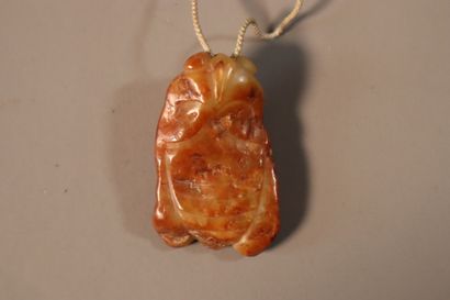 CHINA, 18th century
Pendant in rusty nephrite
in...