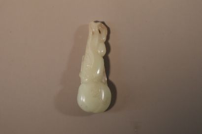 CHINA, About 1900
Three jade (nephrite) pendants...