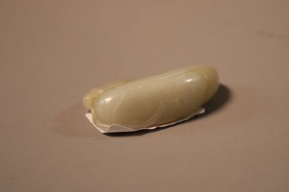 CHINA, About 1900
Three jade (nephrite) pendants...