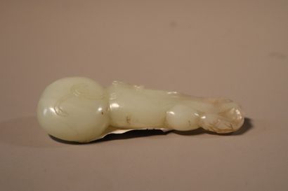 CHINA, About 1900
Three jade (nephrite) pendants...