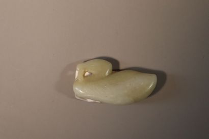 CHINA, About 1900
Three jade (nephrite) pendants...
