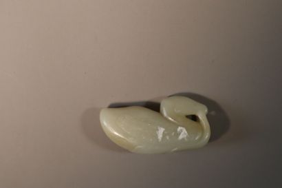 CHINA, About 1900
Three jade (nephrite) pendants...