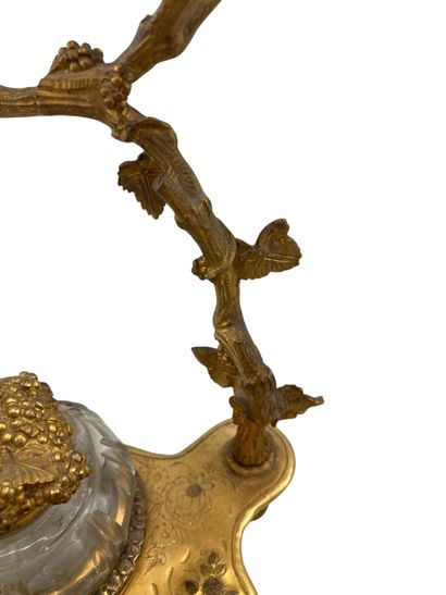 Bronze inkwell with carved decoration representing...