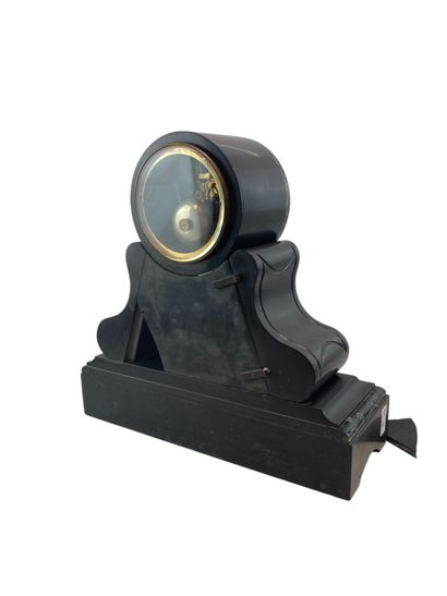 Black marble clock with white and green veins,...