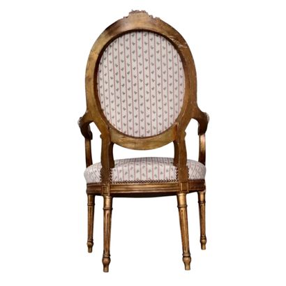 Suite of chairs in the Louis XVI style including...