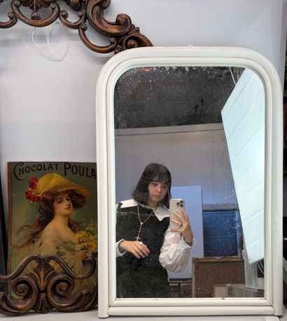 Set including a mirror with a white border,...