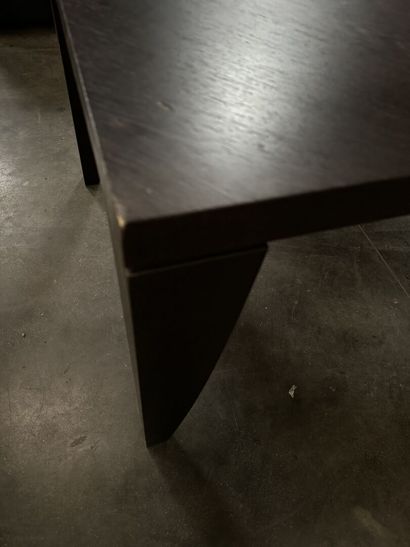 Dark wood dining table with four tapered...