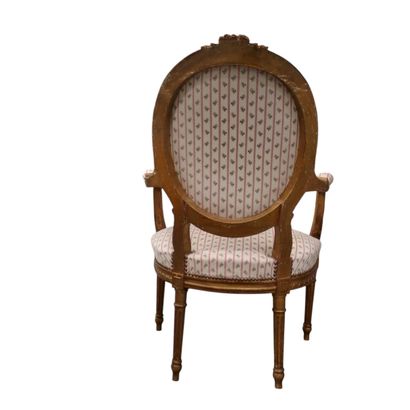 Suite of chairs in the Louis XVI style including...