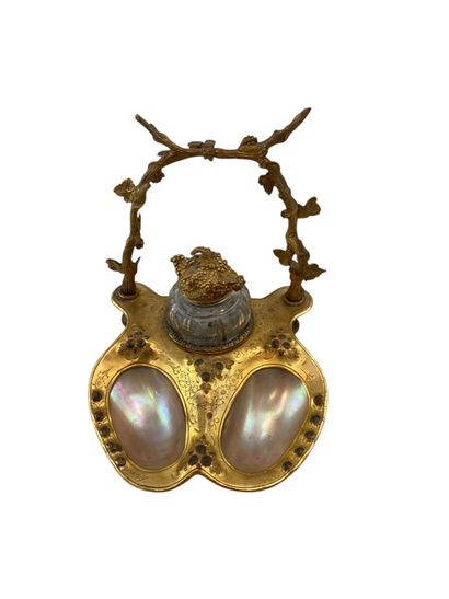 Bronze inkwell with carved decoration representing...